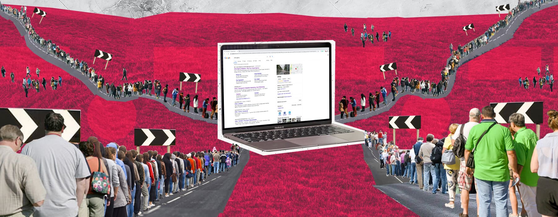 Laptop in the middle of a red field of grass